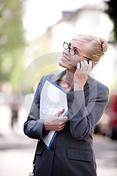 Female Real Estate Agent talking on phone
