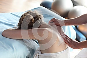 Female receiving back,shoulder massage