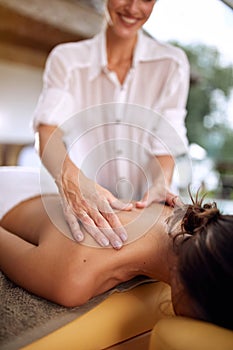 Female receiving a massage in a spa close up