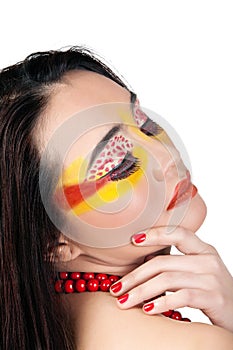Female with red and yellow makeup