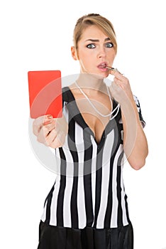 Female Referee With Red Card And Whistle