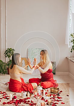 A female reiki master works with patient. Women& x27;s circle, concept of mental health, harmony of body