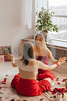 A female reiki master works with patient. Women& x27;s circle, concept of mental health, harmony of body