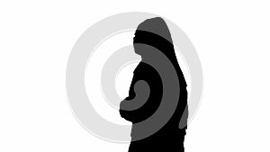 Female reporter black silhouette on white background with alpha channel. African American woman news host in suit walks