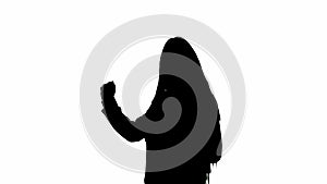 Female reporter black silhouette on white background with alpha channel. African American woman news host with tablet