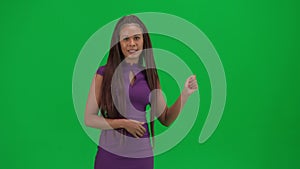 Female reporter isolated on chroma key green screen background. African American woman news host in dress talking