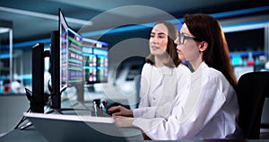 Female research scientist analyzing data