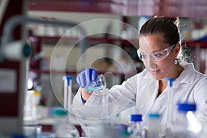 Female researcher carrying out scientific research in a lab