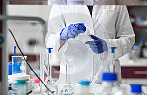 Female researcher carrying out scientific research in a lab