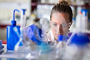 Female researcher carrying out scientific research in a lab