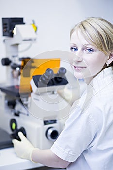 Female researcher doing research in a lab