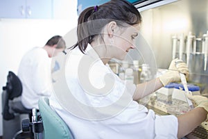 Female researcher doing research in a lab