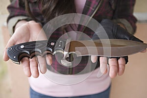 Female Robber With Knife On Her Palms