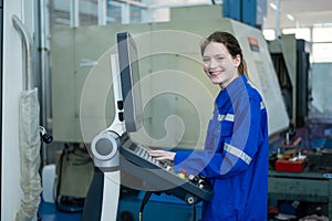 Female Robotics engineers Using Controller to Remotely Operate programming and Manipulating Robot Hand, Industrial Robotics Design