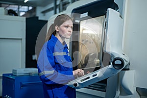 Female Robotics engineers Using Controller to Remotely Operate programming and Manipulating Robot Hand, Industrial Robotics Design