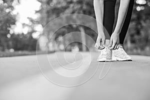 Female runner jogging in the forest