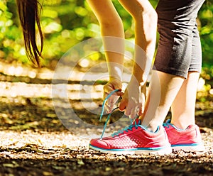 Female runner preparing to jog