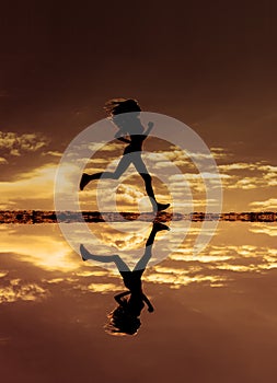 Female runner silhouette