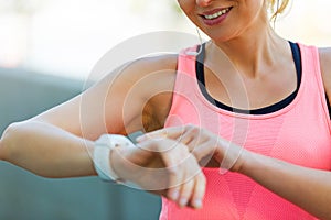 Female Runner With Smart Watch
