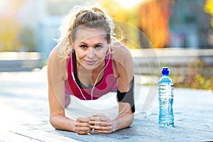 Female Runner Stretching