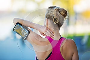 Female runner using smartphone