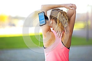 Female runner using smartphone