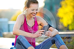 Female runner using smartphone