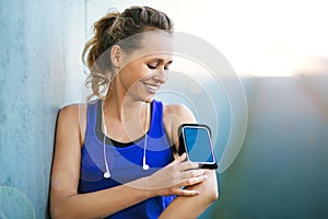 Female runner using smartphone