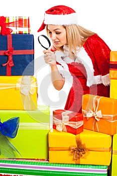 Female Santa exploring Christmas gift