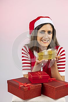 Female santa holding presents