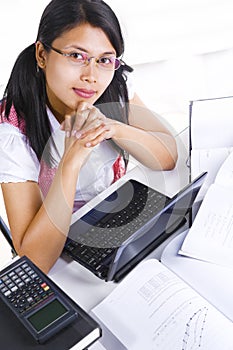 Female scholar looking at camera