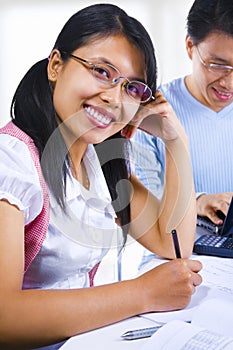 Female scholar smiling to camera