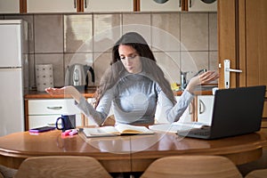 Female science student finding difficult to prepare for exams at home