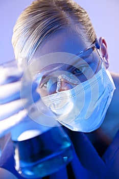 Female Scientist Doctor With Flask In Laboratory