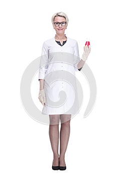 female scientist with a laboratory flask looking forward .