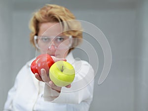 Female scientist offering natural food