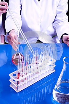 Female Scientists experimenting photo