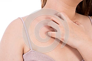 Female scratching her chest isolated white background. Medical, healthcare for advertising concept photo