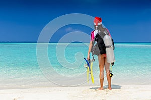 Female Scuba diver with a Santa hat