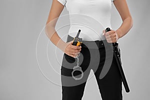 Female security guard with portable radio transmitter