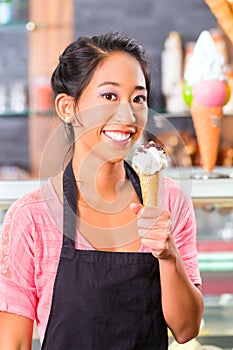 Female seller in Parlor with ice cream cone