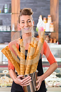 Female seller in Parlor with ice cream cone