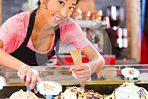 Female seller in Parlor with ice cream cone