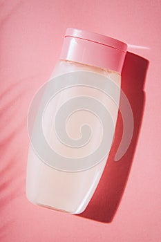 Female shampoo bottle mockup.