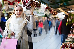 Female shopping at festive fair
