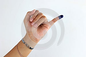 Female Showed hand with Ink for Indonesian ELection or Pemilu Presiden photo