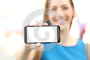 Female showing a blank horizontal phone screen photo