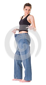 Female shows her old huge jeans, wieght loss