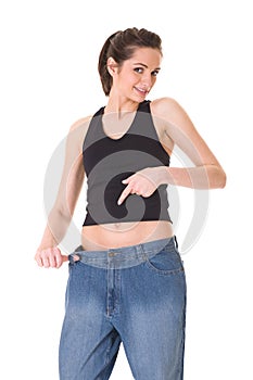 Female shows her old huge jeans, wieght loss