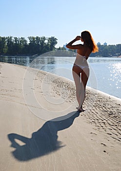 Female silhouette and full-length shadow